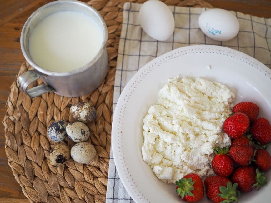 High-protein foods including eggs, fish and cottage cheese, tracked with a macro tracker with a barcode scanner