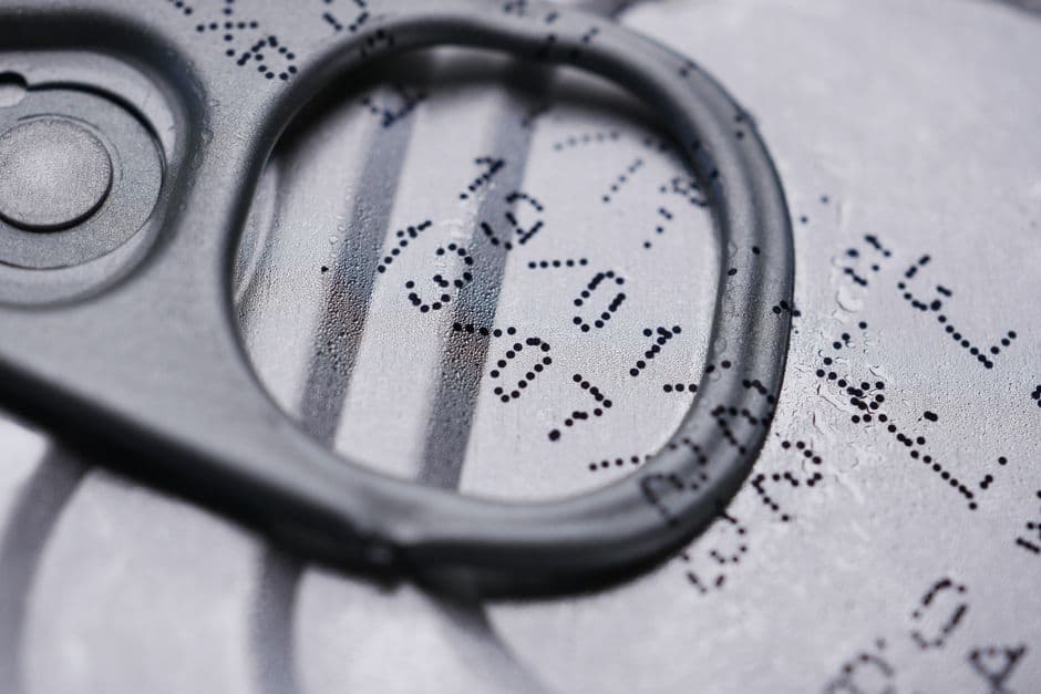 Close-up of a nutrition facts label on food packaging, the panel a nutrition facts scanner reads back